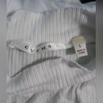 Cyrus solid white sleeveless blouse Photo 1