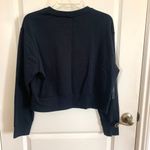 Nike Cropped Long Sleeve Sweatshirt in Black with Colorful Logo Photo 5