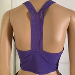 Nike Training Indy Ulterbreathe Dri-FIT ADV light support sports bra in purple Photo 9