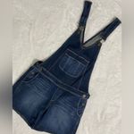 Paige denim short overalls.These overalls are dark wash. Photo 1