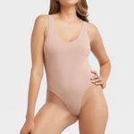 Maidenform Women's Shapewear Seamless Thong Bodysuit with Light Shaping MST001 Photo 0
