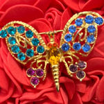 Elegant Gold Butterfly Brooch with Blue and Purple Accents Photo 0