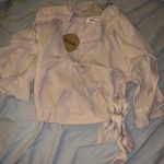 Essue NWT Size medium  beige wrap top! Photo 2