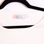 Free People  Cotton Blend Stretch Knit Scoop Neck Lettuce Bib Ruffle Hem Sweater  Photo 1