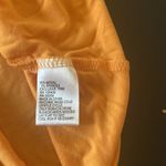 Antonio Melani  orange ruffled shoulder small 3/4 sleeve stretch material blouse Photo 5