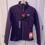 The North Face purple jacket Photo 0