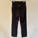Lululemon  Leggings sz 4 Black Print Cropped Length Leggings Photo 3
