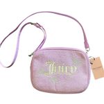 Juicy Couture NWT--WINGIN IT CROSSBODY CAMERA BAG MSRP$75 Lavender plush material Butterfly design and charm measures 9x6.5 inches Brand new with tags Photo 0