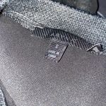 Aryn K  small semi sheer black longsleeve hi-low Photo 3