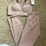 Pink Sports Bra and Leggings Set Purple Size M Photo 0