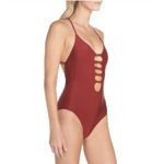 Becca New. knotted one piece. Size medium. Retails $129 Photo 3
