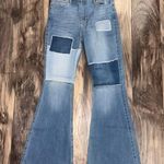 Hollister  Denim Distressed Patchwork Flared Jeans  Photo 1