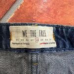 Free People  Blue Distressed Raw Hem Front Button Denim Mini Skirt Size 28 Photo 2