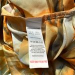 Pretty Little Thing β
NWT Ruched Side Midi skirt - Orange Tie Dye β
Photo 14