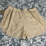 Nike  Women's Dri-FIT Tempo Mid-Rise Brief-Lined Running Shorts Photo 3