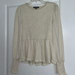 Boutique Cream Peplum Top Photo 0