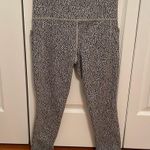 Athleta Salutation Stash II Textured Tight in Black and White Leopard Print Photo 1