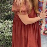 Giddy Up Glamour Seasonal Spice Puff Sleeve Babydoll Dress In Dark Rust Photo 1