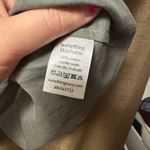 Something Navy  Woman’s Felix Ruffle Top Size Small Olive Green Photo 3