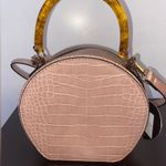 Imoshion IMO pink alligator round zipped purse with removable and adjustable strap Photo 1