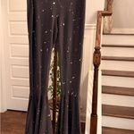 People Of Leisure NWOT Black Paint Splatter Bottom Flare Leggings w/ Slit Flare White Photo 2