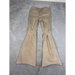 risen tan flare jeans raw hem 28 stretch distressed spots shown on leg Brown Photo 1