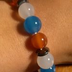 Red, White, and Blue Agate And Hematite Stainless Steel Bracelet Photo 5