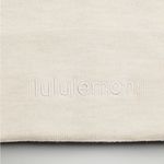 Lululemon  NWT Warm Revelation Beanie Merino Wool Blend Heathered Bone Color Photo 2