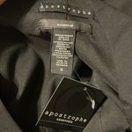 Apostrophe  Essential plus size black dress with open neckline and thick straps. Photo 6