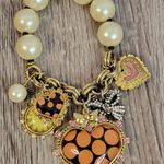 Betsey Johnson Half-Stretch Lips Charm Bracelet and Necklace Photo 1