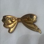 Vintage bow shaped pin with crystal accents EVC perfect for a lapel or scarf Gold Photo 1