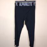 Alphalete Women’s Athletic Spell Out Waistband Criss Cross Cutout Black Leggings Photo 4