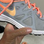 Nike  Revolution Women's Athletic Shoes Gray and Orange Photo 4