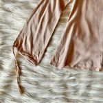 Olivaceous Light Pink Tan Boho Flowy Tassel Tie Key Hole Neck Long Sleeve Top Photo 90