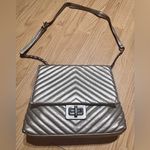 Jessica Simpson  like new Elegant Silver Quilted Shoulder Bag Photo 1