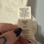 Free People  Cream Graphic Embroidered T-Shirt with Earth Design size Small Photo 5