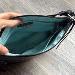 The Sak  Black Leather Crossbody Bag Floral Embossed Everyday purse Photo 4