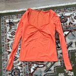 Aritzia  Babaton Long Sleeve Twist Orange Top Photo 0