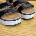 UGG  Women's Braelynn Black Patent Leather Suede Sandals Photo 4