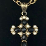 Elegant Gold and Black Cross Pendant Necklace
Great Gift 🎁 Wrapping Available Photo 0