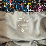 Nike Women’s Dri-fit multi color funky dot colorway lined athletic shorts large Photo 2