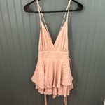 Style Rack  Romper‎ with Ruffles and Low Back, Size Medium pink Photo 1