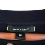 Stella & Dot  black long sleeved top with ruffle detail at hips size medium Photo 4