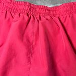 Nike  Dri-FIT Running Shorts Womens Medium Pink White Purple Athletic Gym Photo 7
