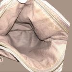 Medium size tan faux leather shoulder bag with fringe front! Tan Photo 4