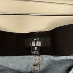LuLaRoe Women’s 36 Blue Stretchy Denim Jeans Flare Photo 1