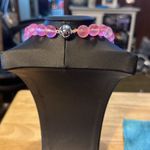 Mermaid glass necklace. These are very rare. This is pink iridescent. Beautiful. Photo 1