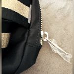 Lululemon  Everywhere Belt Bag 1L *Wordmark
Colour Black/Gold/White Opal Photo 8