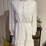 Simplee Apparel Crochet Lace inserts Pompom 3D ilusión Print Eyelet Embroidered Dot pattern Fit Flare circle print boho Western Mini Knee Photo 0