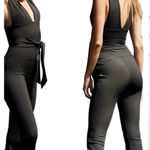 Free People movement black deep v tie waist jumpsuit Photo 4